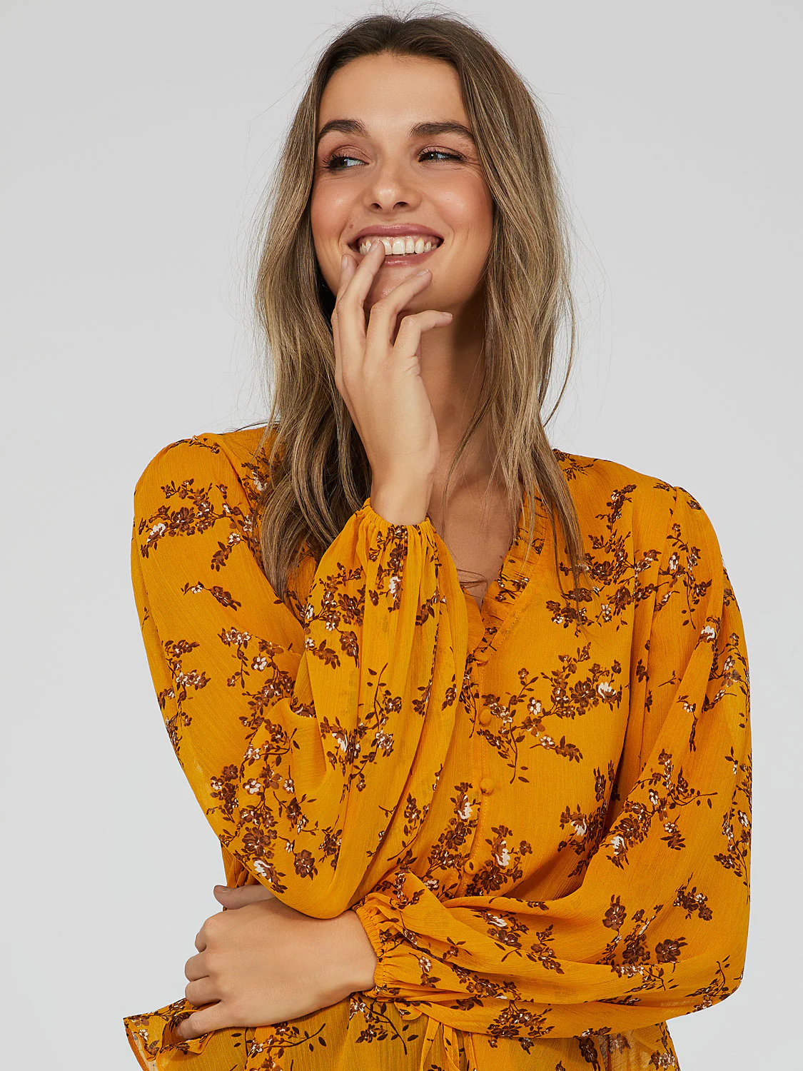 Printed V-Neck Peplum Blouse