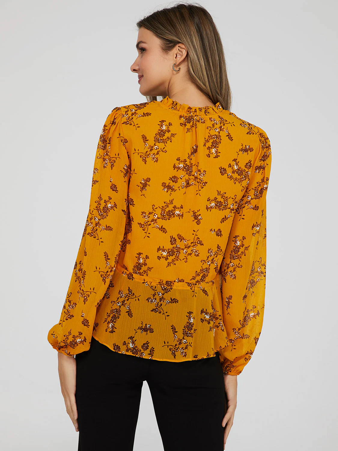 Printed V-Neck Peplum Blouse