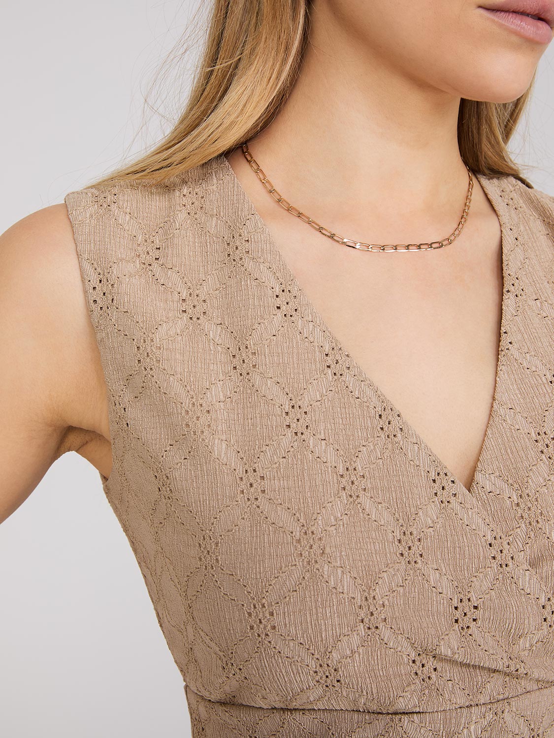 Sleeveless Crossover Front Eyelet Top