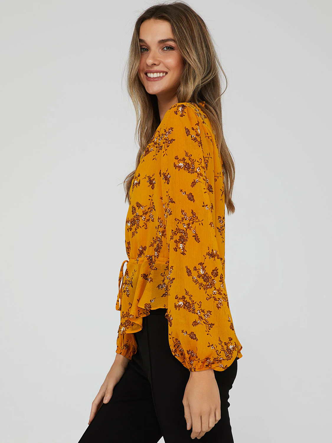 Printed V-Neck Peplum Blouse
