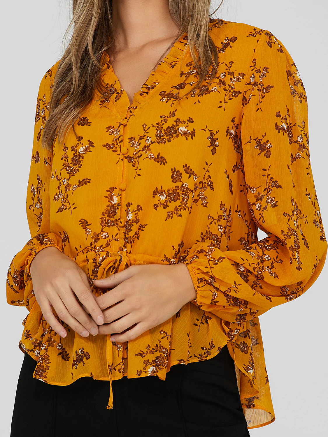 Printed V-Neck Peplum Blouse