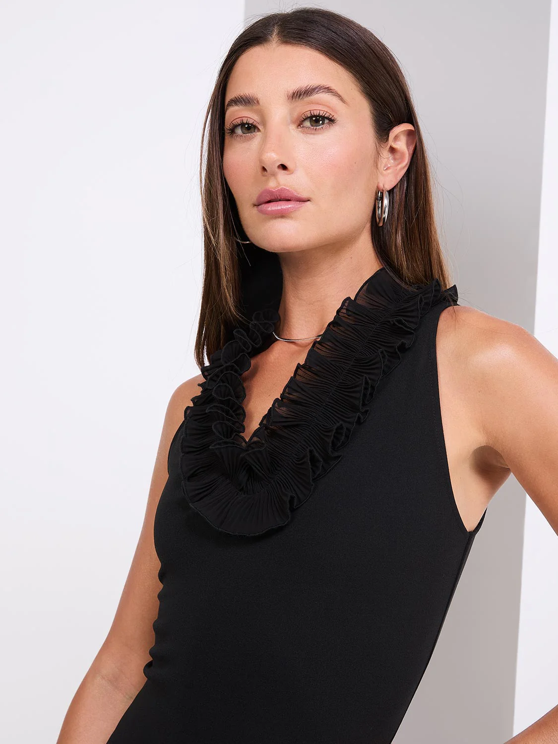 Sleeveless Ruffle V-Neck Scuba Bodysuit