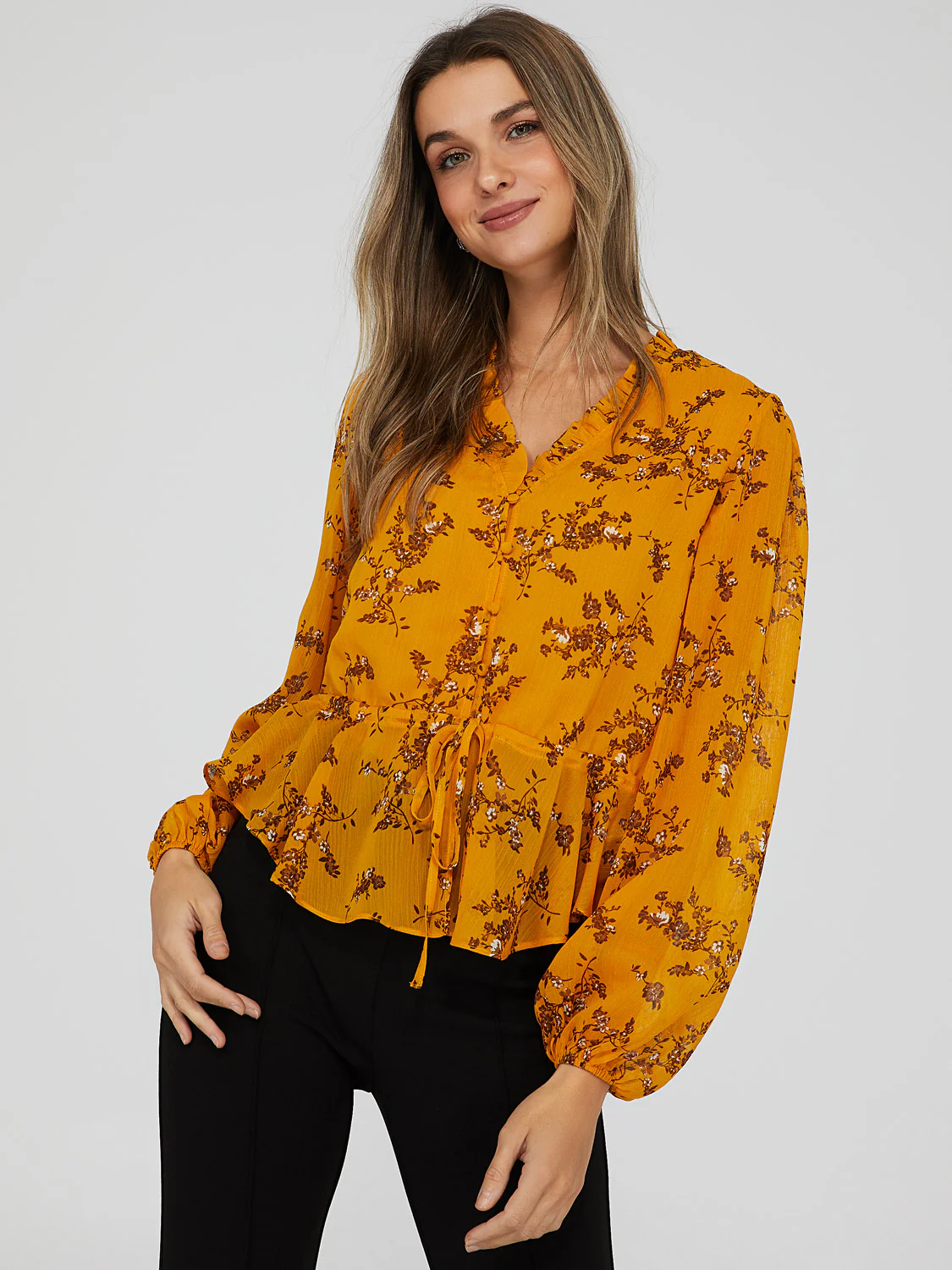Printed V-Neck Peplum Blouse