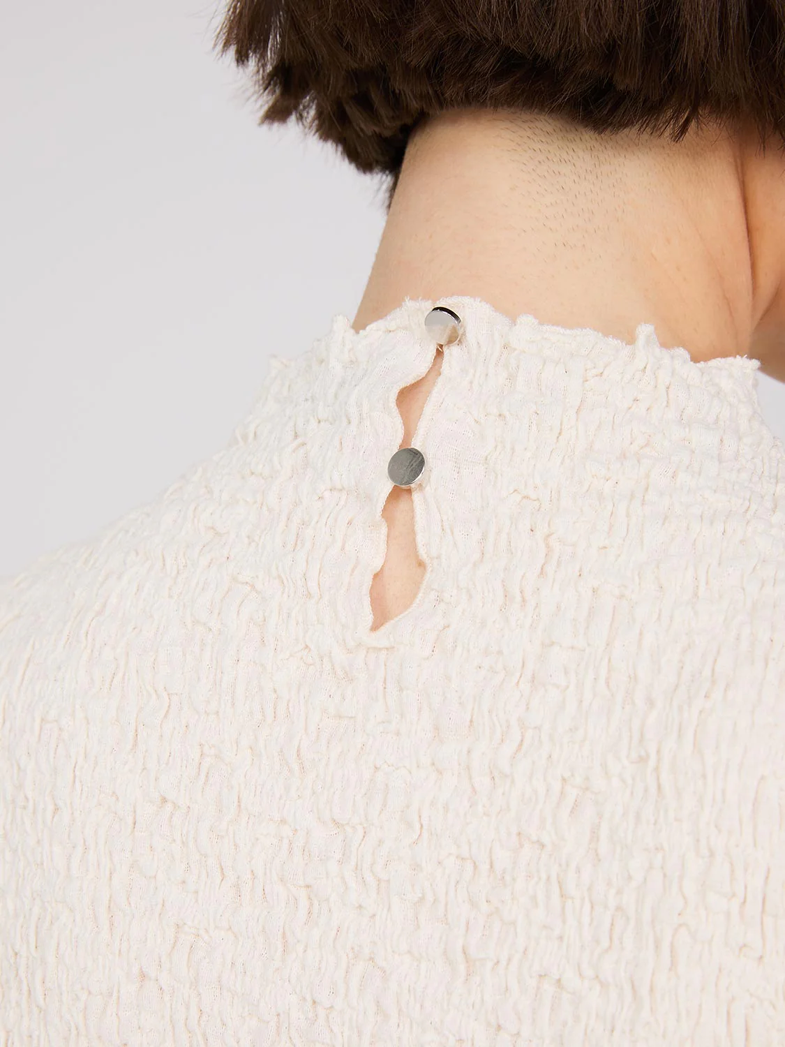 Sleeveless Textured Mock Neck Top