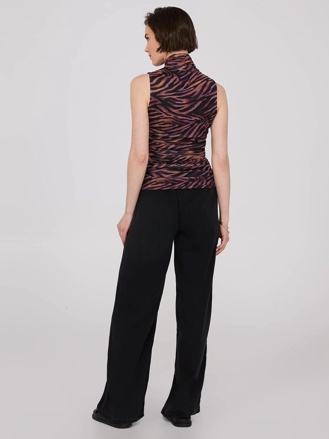 Sleeveless Zebra Print Mock Neck Top
