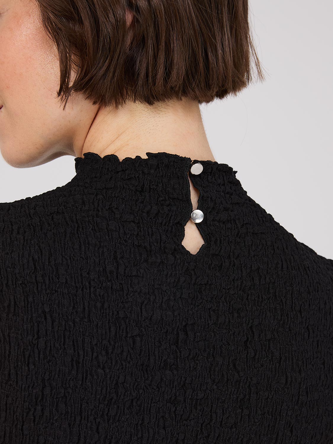 Sleeveless Textured Mock Neck Top