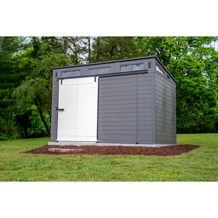 Suncast Modernist 10 ft. 9.5 in. W x 7 ft. 3.5 in. D Barn Door Resin Storage Shed collection | LIDL