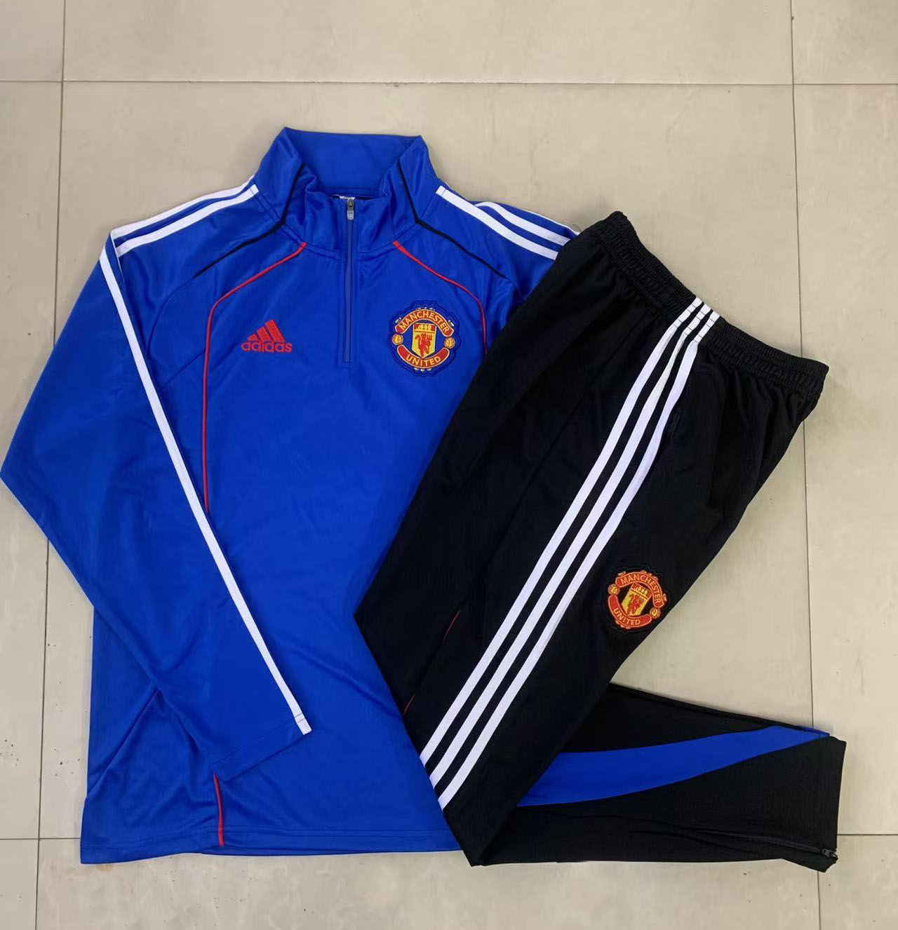 Kids Manchester United Training Kit (Sweatshirt+Pants) Blue 2025/26